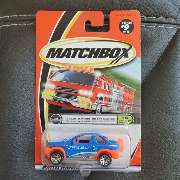 2000 MATCHBOX TEAM TUNDRA SERIES #9 of 75 LAND ROVER FREELANDER Blue Orange New - Picture 1 of 4